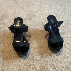 Charles woman’s black wedge heel